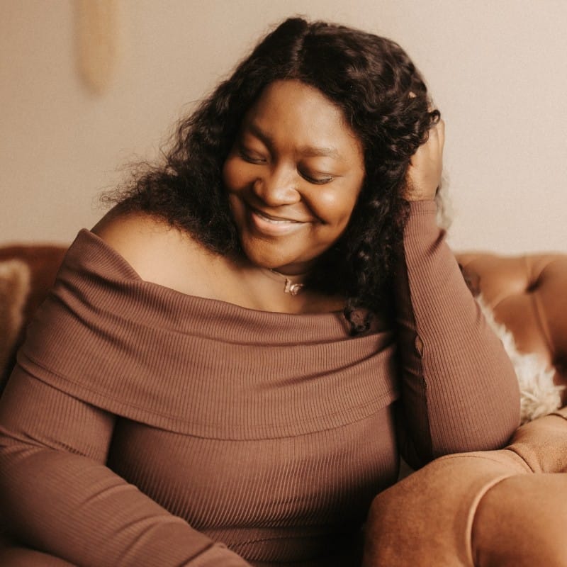 Portrait of Temi, luxury portrait photographer in Hamilton, Ontario, specializing in empowerment and legacy photography